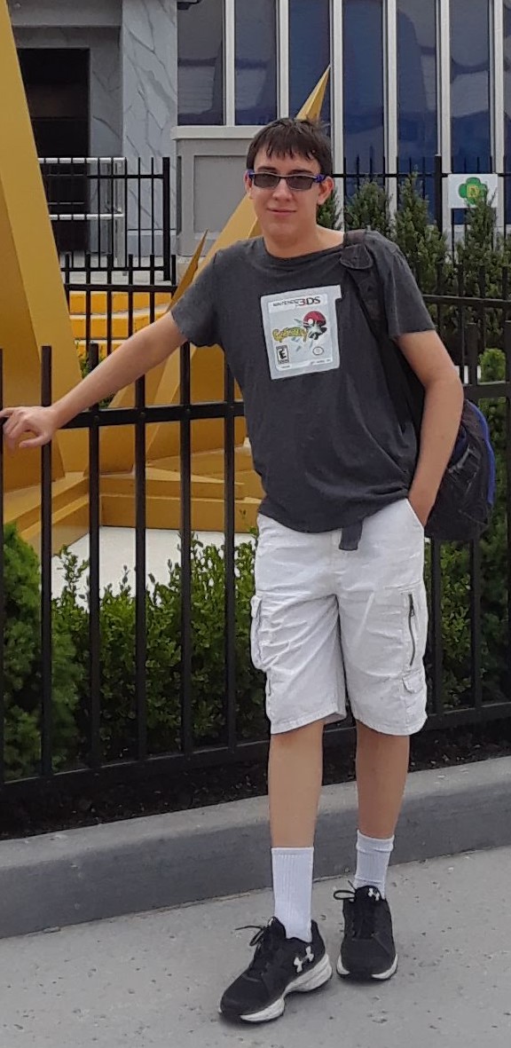 a picture of Geremy Delgado leaning against a railing